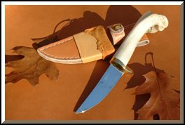 (Artist's Collection) hand-made hunting knife, O-1 steel, brass, deer bone handle with custom cowhide & deer-skin sheath